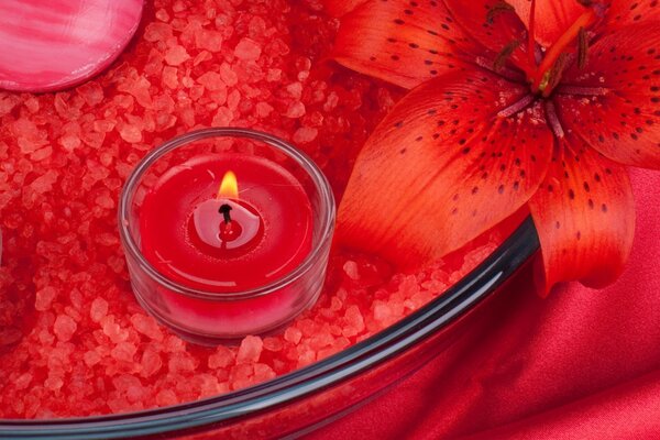 Candle with a flower in the spa