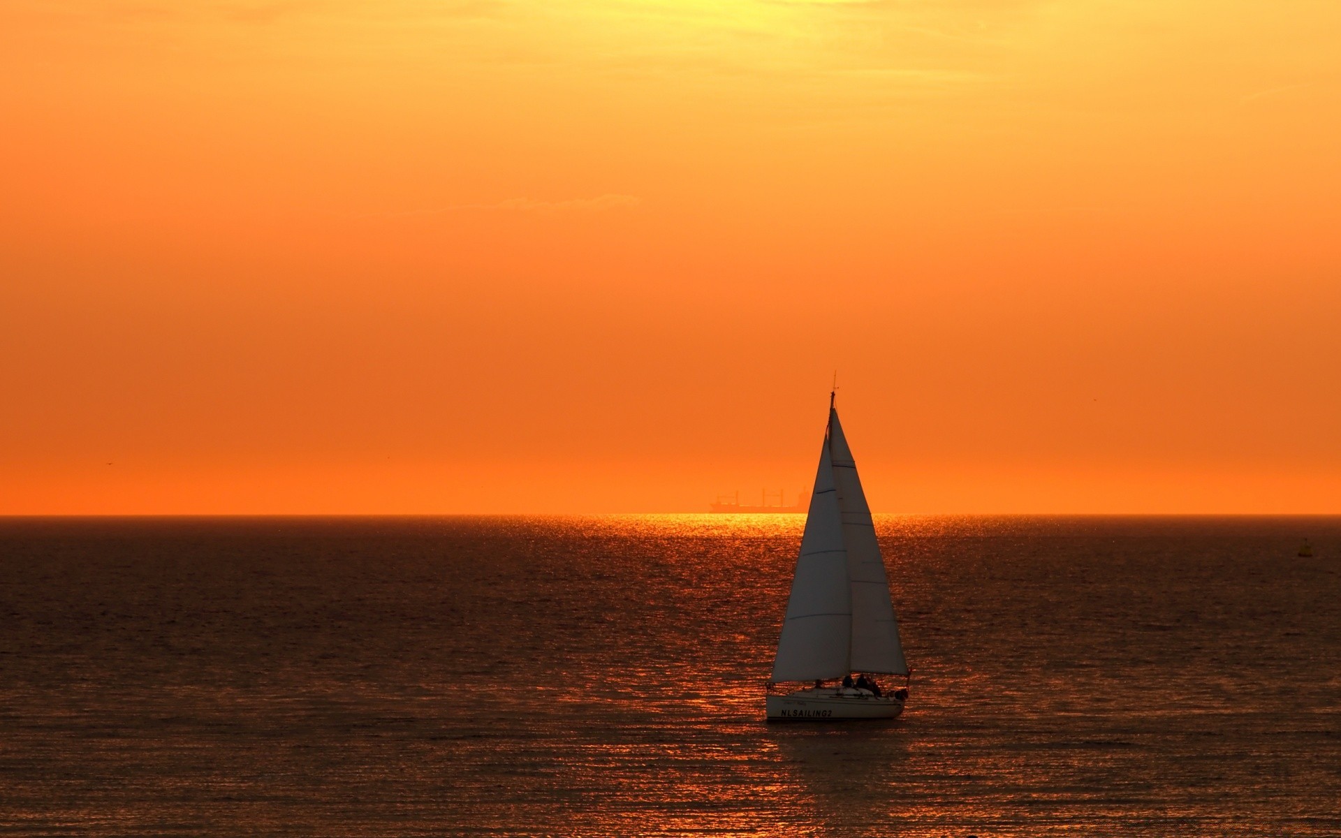 sea and ocean sunset water ocean sea dawn sailboat boat dusk sun sky watercraft evening seascape beach travel sail yacht transportation system light