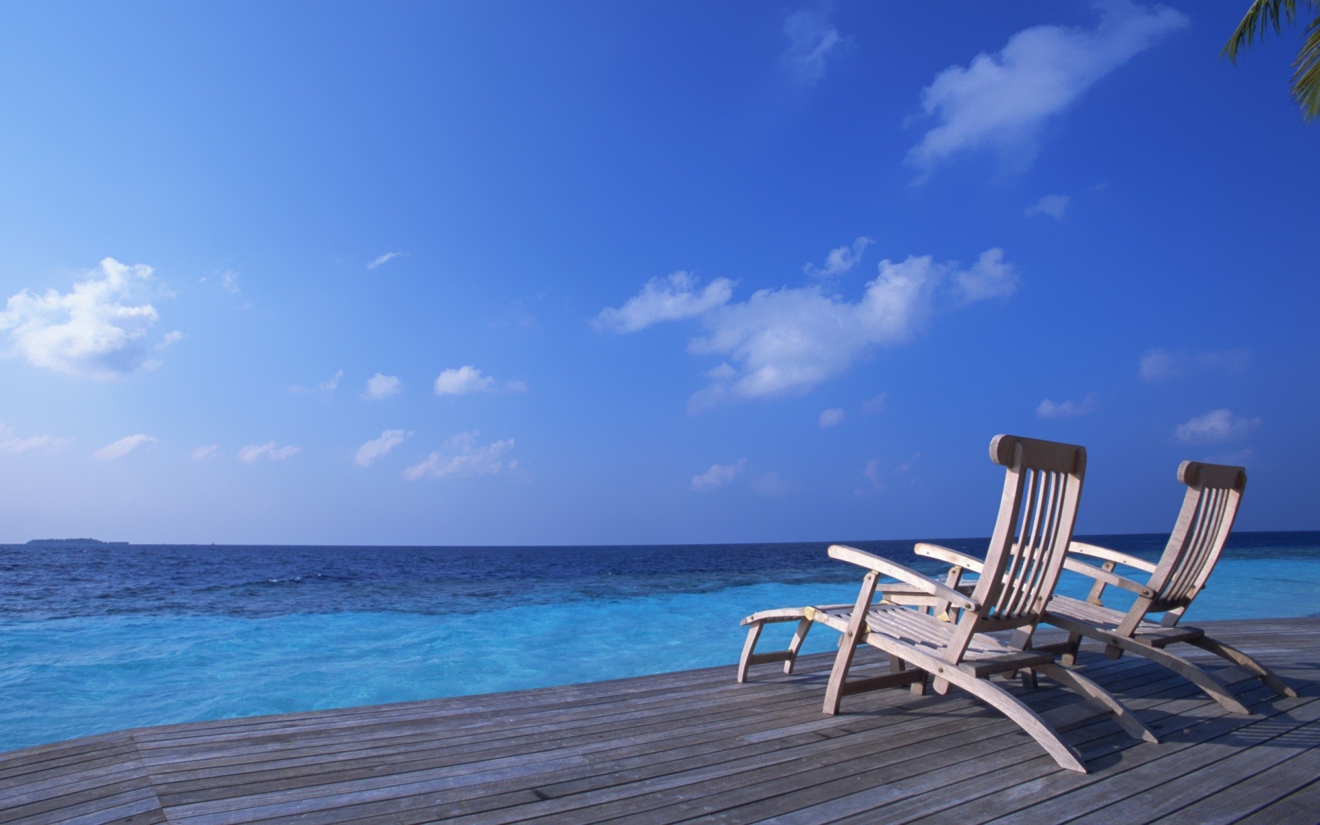 sea and ocean relaxation summer chair water travel tropical beach sun sand idyllic vacation sea ocean leisure seashore resort fair weather exotic sky