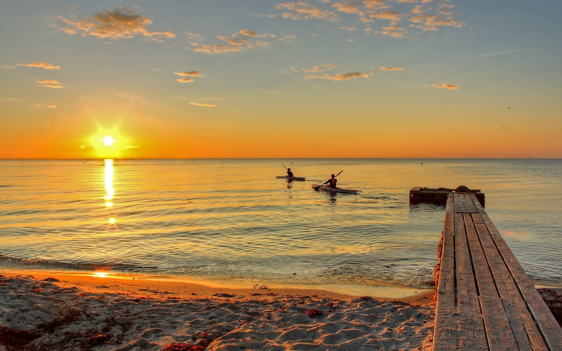 sea and ocean sunset sun dawn beach water sea ocean dusk fair weather sand evening summer seascape relaxation sky seashore surf