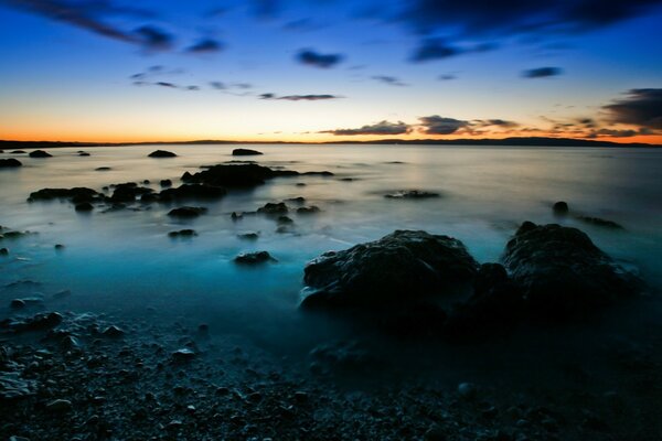 Rocky beach at dusk