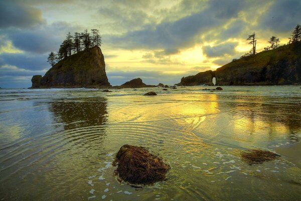 Taiga lonely rocks in the bay