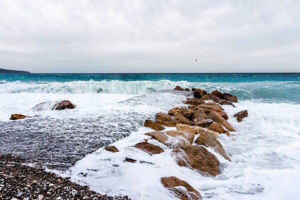 The waves. Sea and ocean. Stones