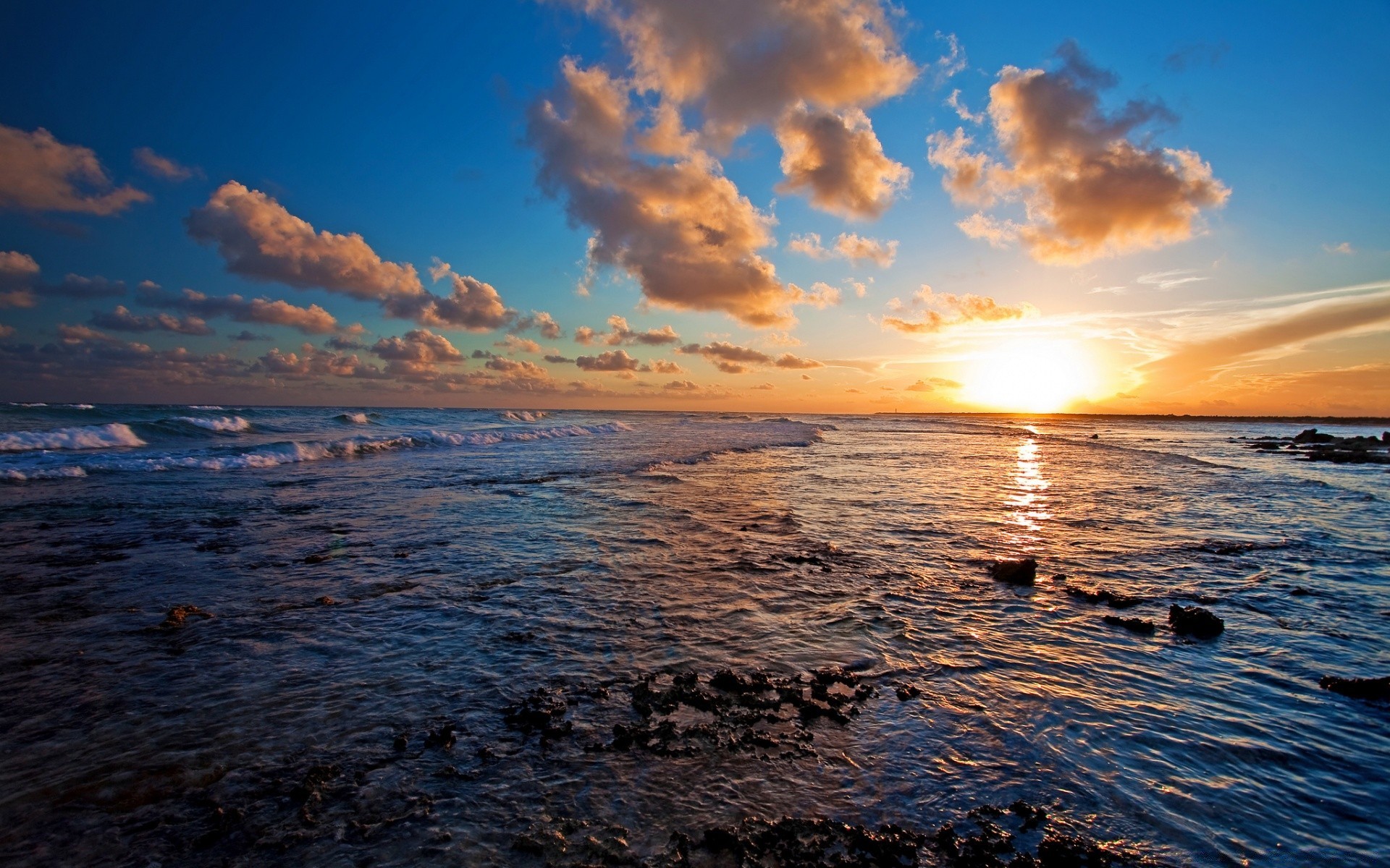 sea and ocean sunset water sun dawn dusk evening sea ocean beach sky seascape fair weather