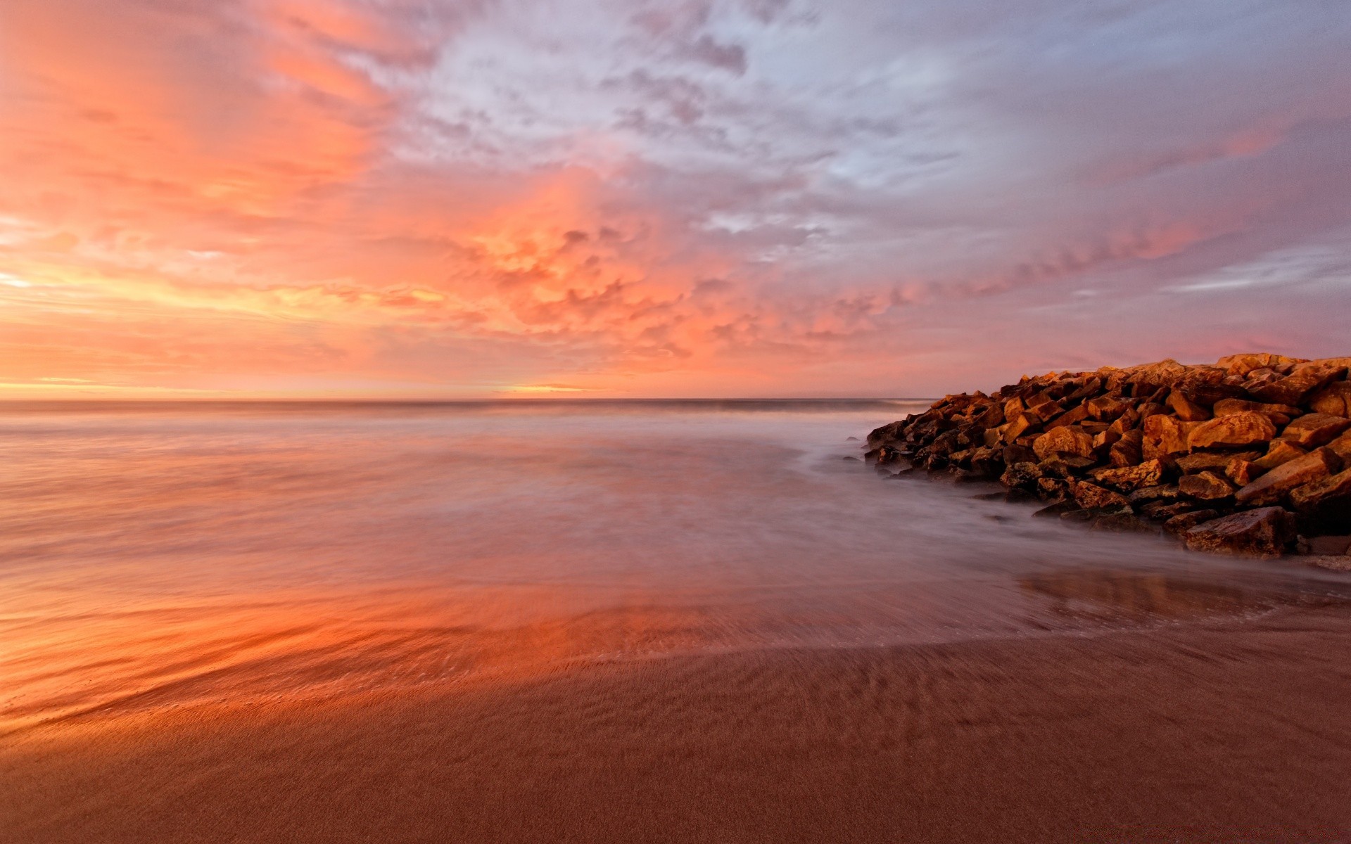 sea and ocean sunset water dusk beach dawn evening ocean sea sun seashore sky sand travel nature seascape landscape outdoors fair weather surf