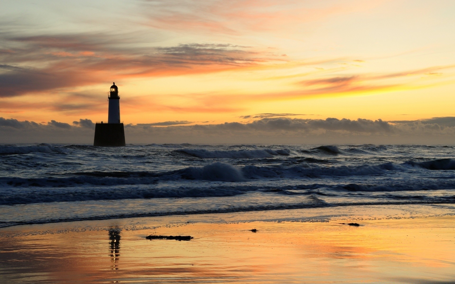 sea and ocean sunset water lighthouse dawn sea ocean beach dusk evening sun seascape seashore sky travel nature