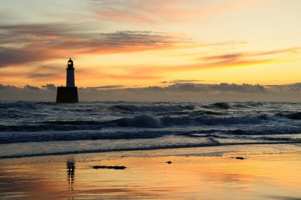 A lighthouse in a raging sea illuminates the way for travelers