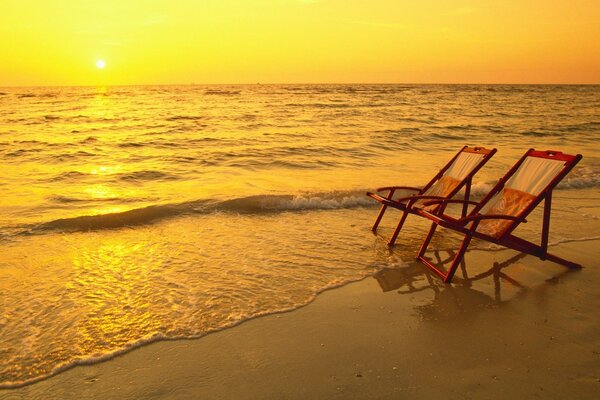 The tide came in, but the chairs were not removed