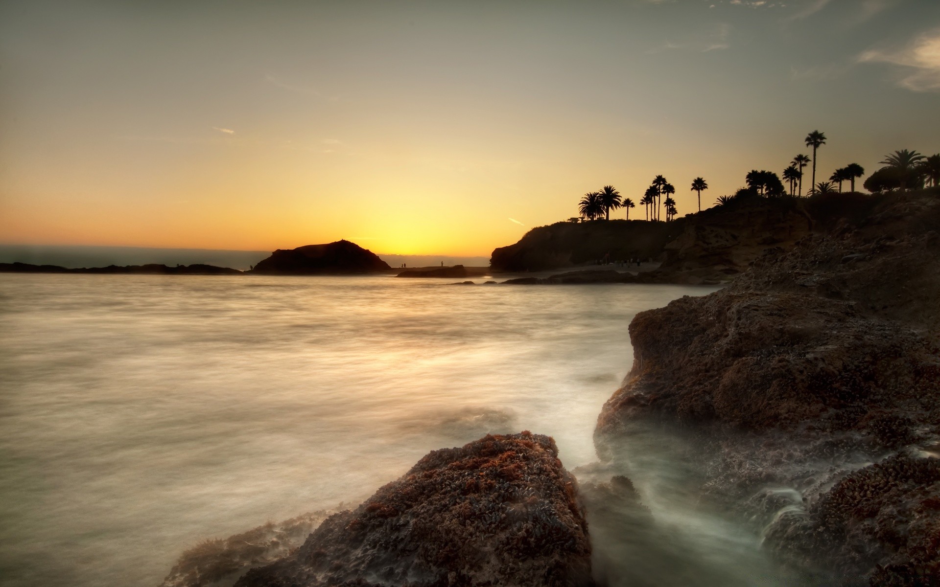 sea and ocean sunset water beach ocean sea dusk seashore dawn evening seascape travel surf sun sky landscape rock