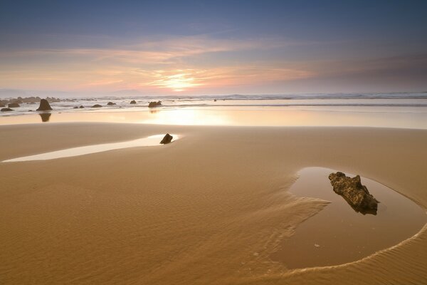 The sea, the sun and the beach surround us