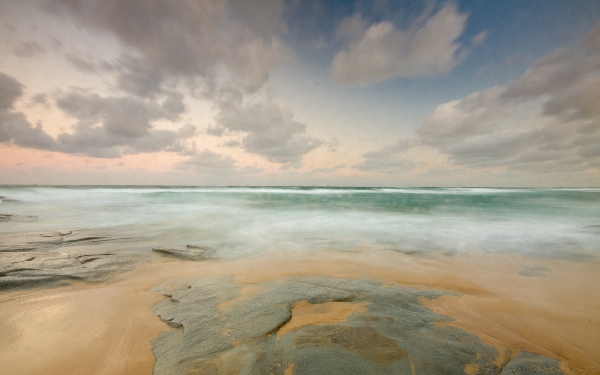 sea and ocean sand beach water seashore ocean sea surf travel tropical seascape sun summer fair weather wave sky island landscape vacation cloud