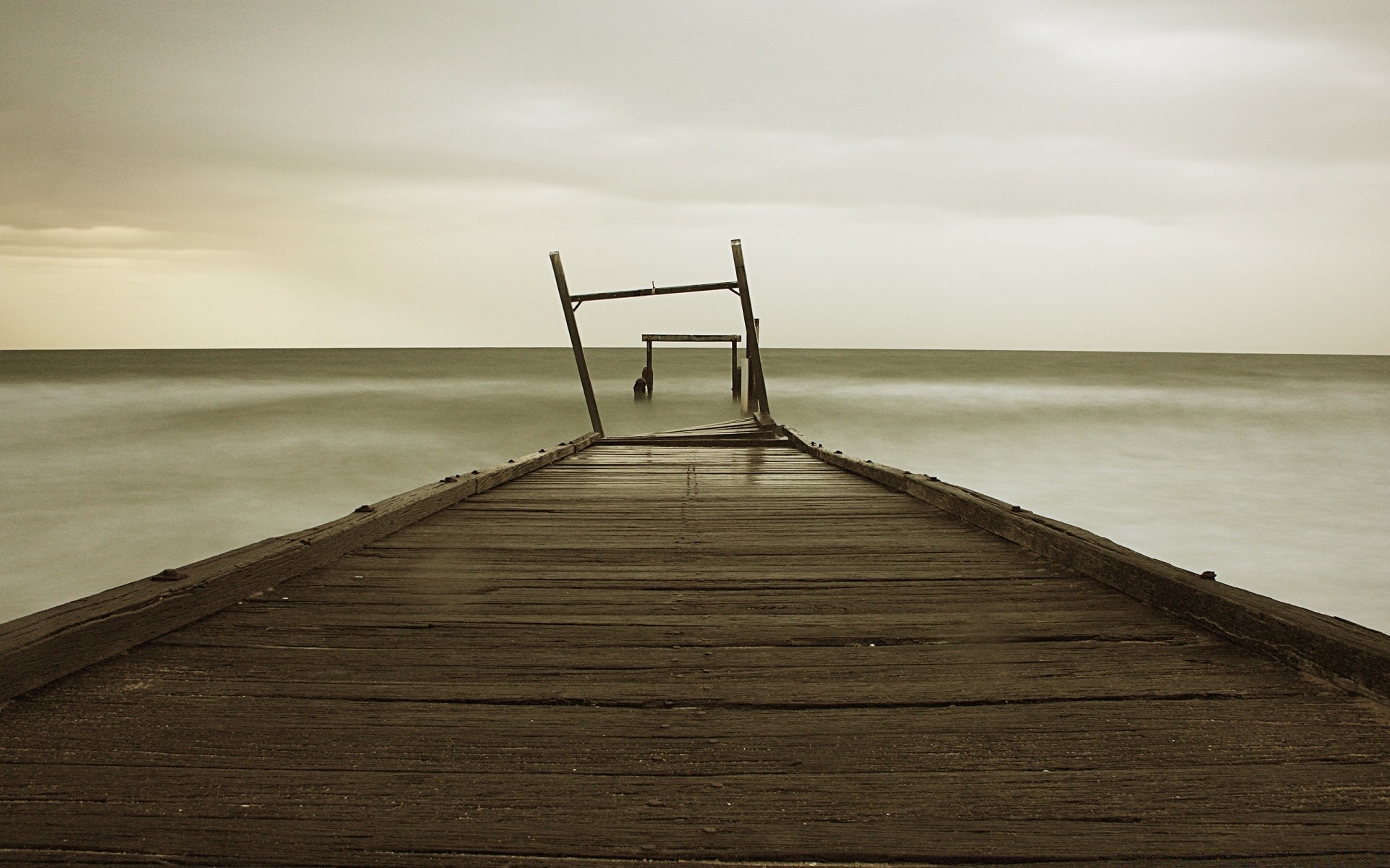 morze i ocean plaża ocean morze woda molo zachód słońca morze promenada piasek drewno krajobraz molo słońce niebo krajobraz natura jezioro podróże drewniane świt