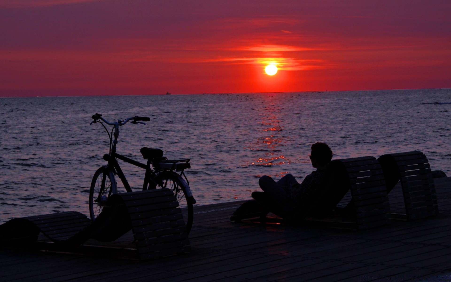 sea and ocean sunset water dawn sea ocean evening dusk beach backlit silhouette seashore travel sun vehicle transportation system seascape landscape