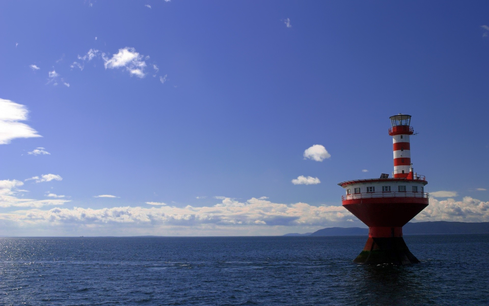 sea and ocean water lighthouse sea travel ocean sky outdoors watercraft seashore transportation system ship vehicle summer beach