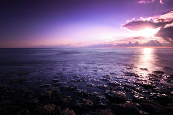 Cosmic sunset on the stone seashore