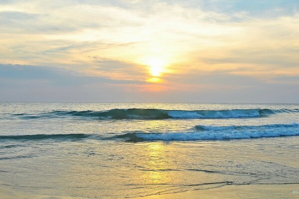 Small waves on a sandy beach