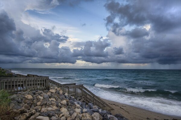 Rocky shore on the waves of the sea