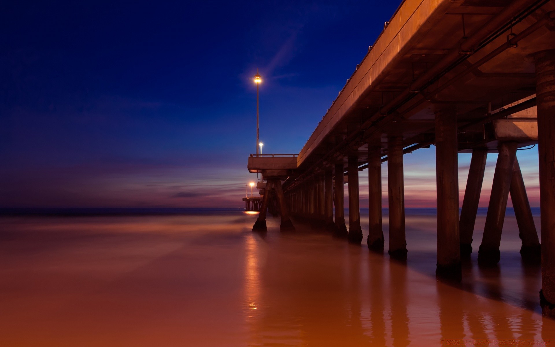 sea and ocean water sunset sea ocean beach dusk travel sky dawn evening pier bridge seashore sun outdoors light sand