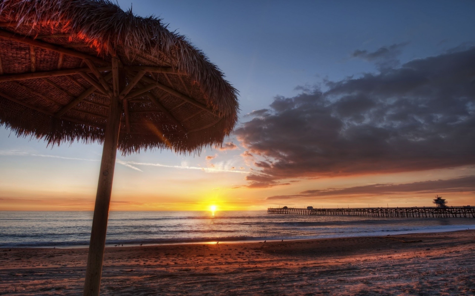 mar y océano puesta de sol playa agua océano amanecer sol mar arena crepúsculo mar noche viajes paisaje cielo verano tropical isla