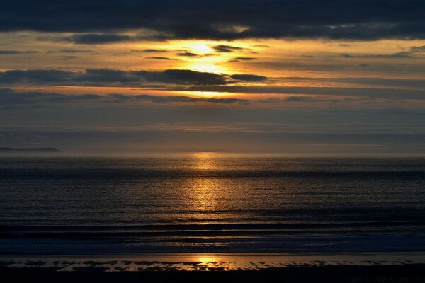 Incredibly charming copper sunset on the sea in calm