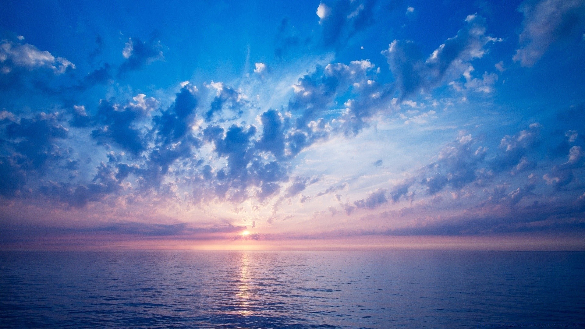 mer et océan soleil eau coucher de soleil été beau temps ciel paysage nature lumière du jour aube à l extérieur idyllique scénique mer soirée crépuscule lumière ciel océan