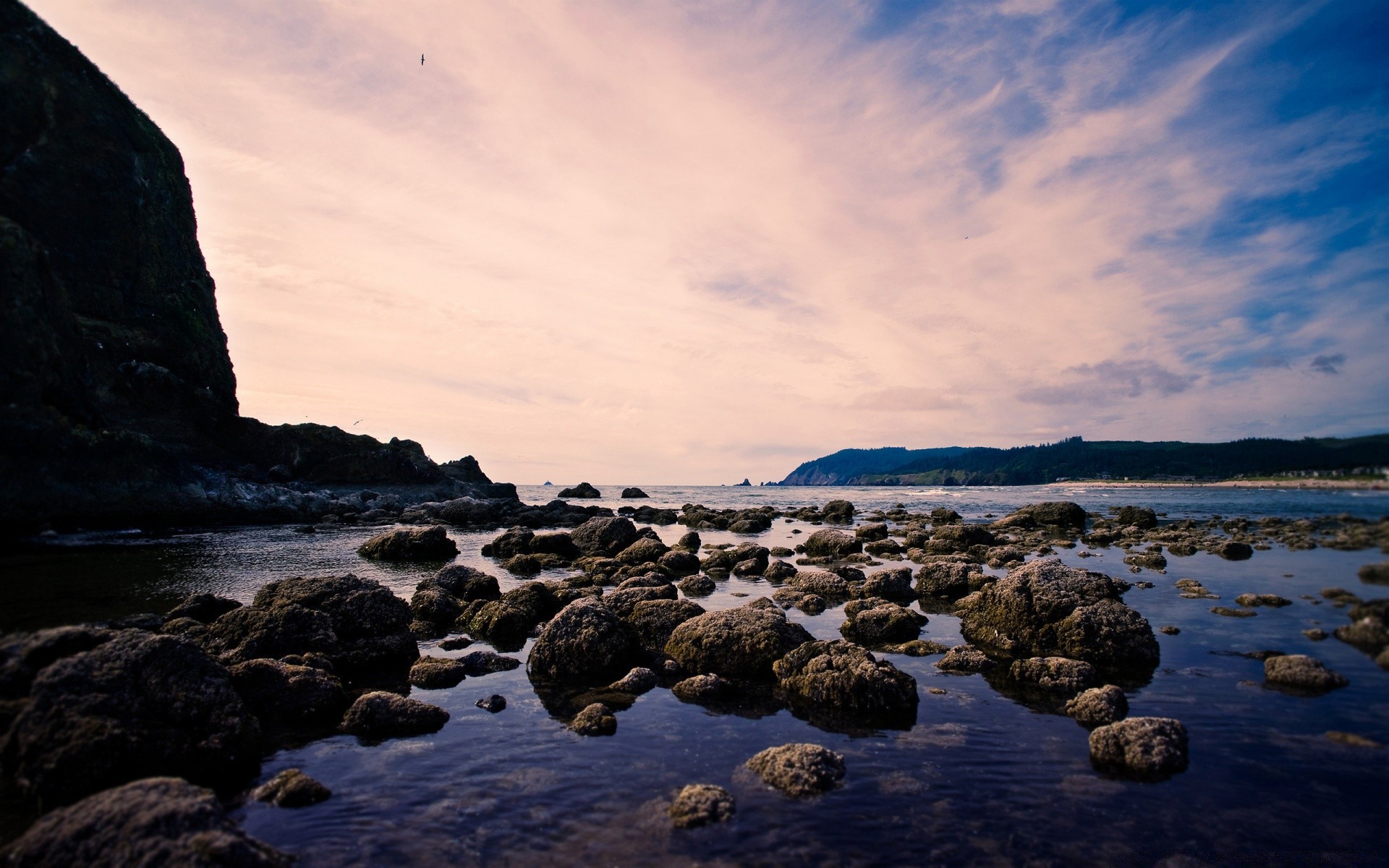 sea and ocean water seashore beach sea sunset rock sky landscape ocean nature travel outdoors seascape dawn dusk evening