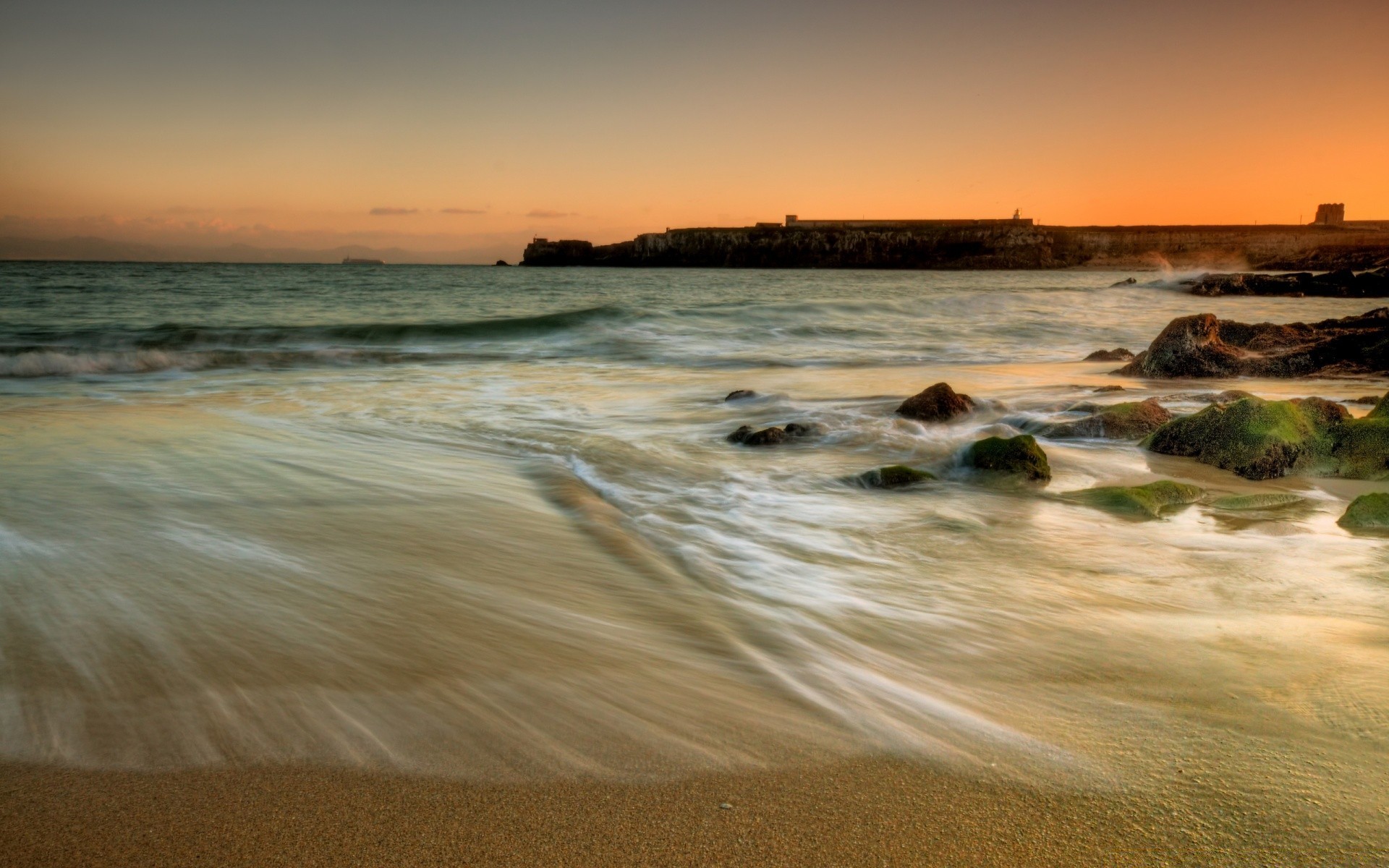 sea and ocean beach sunset sea water ocean sand seashore seascape sun surf wave dawn travel dusk evening sky landscape summer fair weather vacation