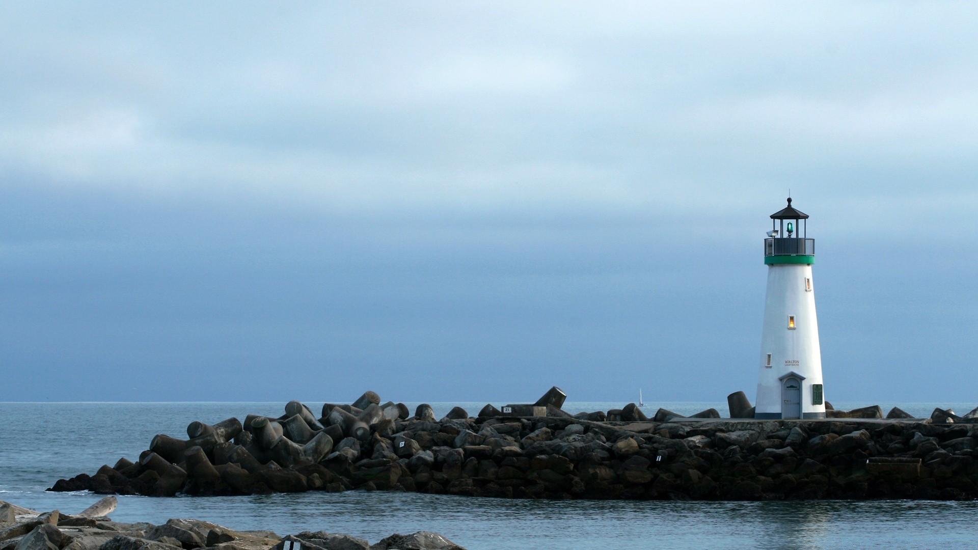 sea and ocean lighthouse seashore sea water beach ocean sky travel daylight outdoors rock landscape light island