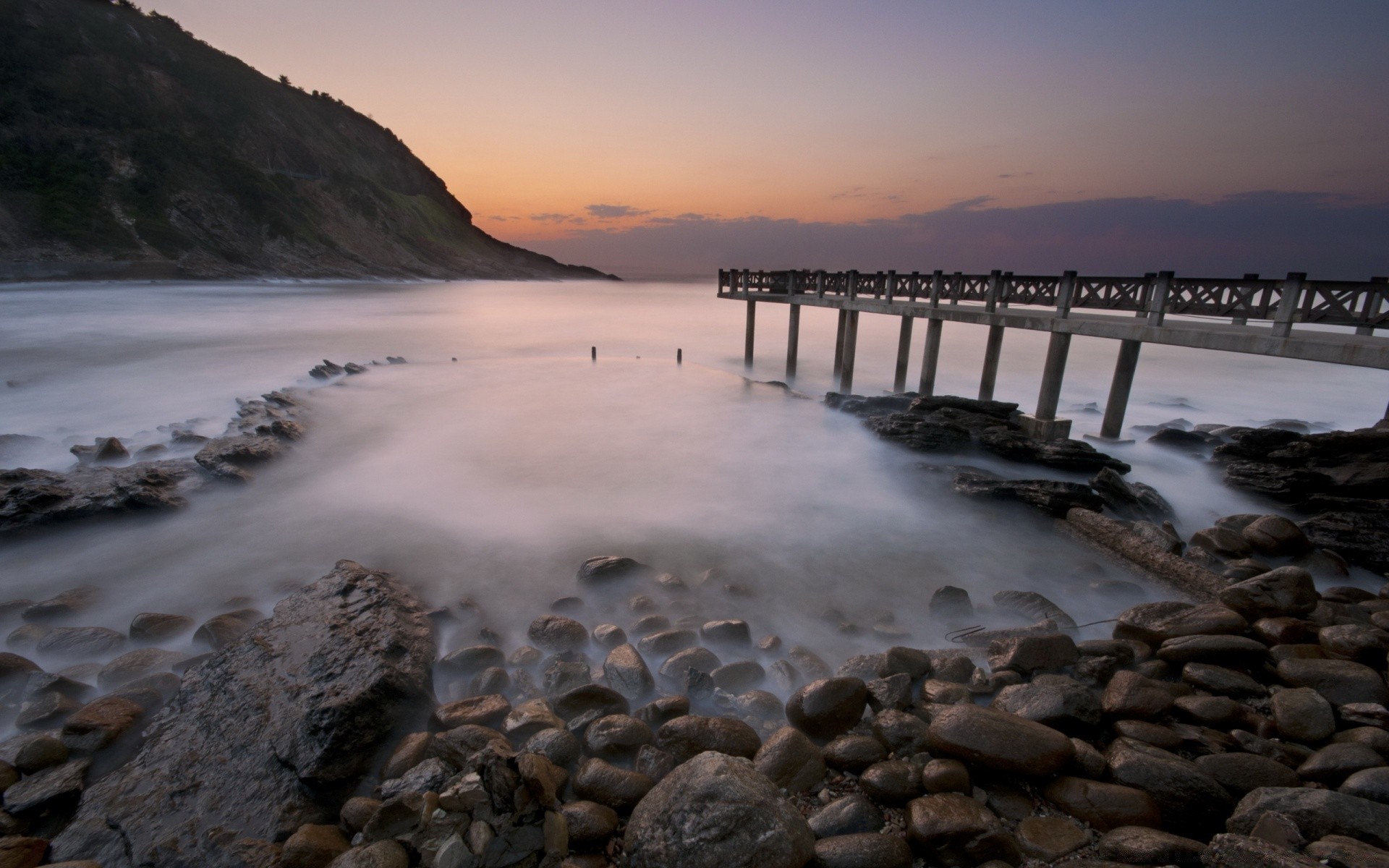 mare e oceano spiaggia acqua mare tramonto mare alba oceano viaggi paesaggio sera roccia paesaggio cielo crepuscolo riva sabbia natura sole surf