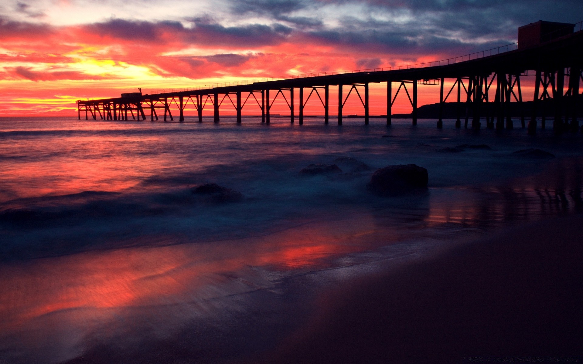 sea and ocean sunset water bridge dawn dusk evening ocean sea beach reflection travel pier sky photograph sun seascape