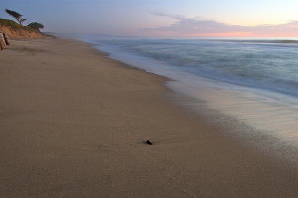 Sunrise beach on the sea or ocean with sand