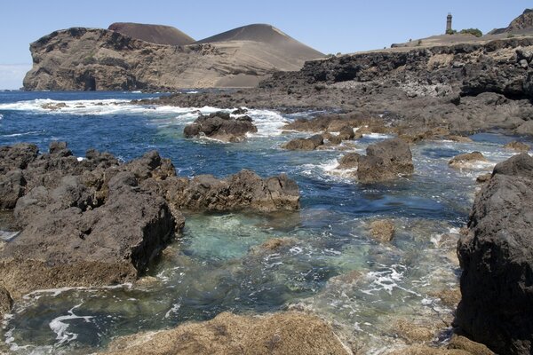 Sea surf in the rocky shore