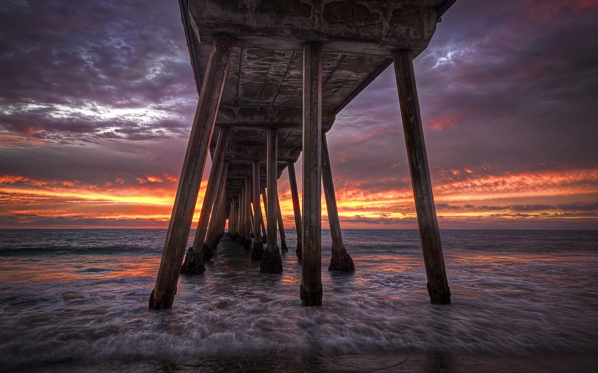 sea and ocean water sunset ocean sea beach sky dawn dusk sun landscape seashore travel sand seascape pier evening