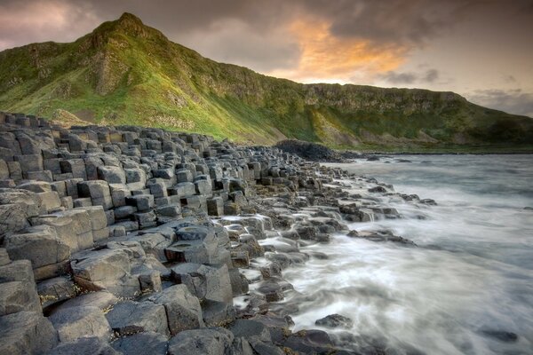 The sea in bad weather with a stone shore