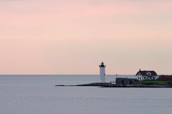 Sea and lighthouse, clear sky