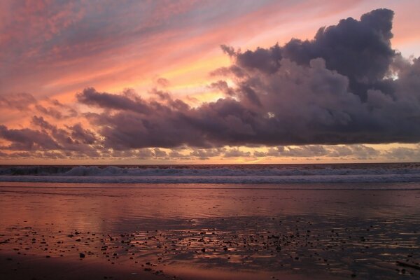 Beautiful sunset on the background of the sea