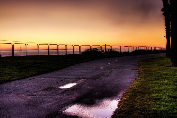 Sunrise meeting on the ocean embankment