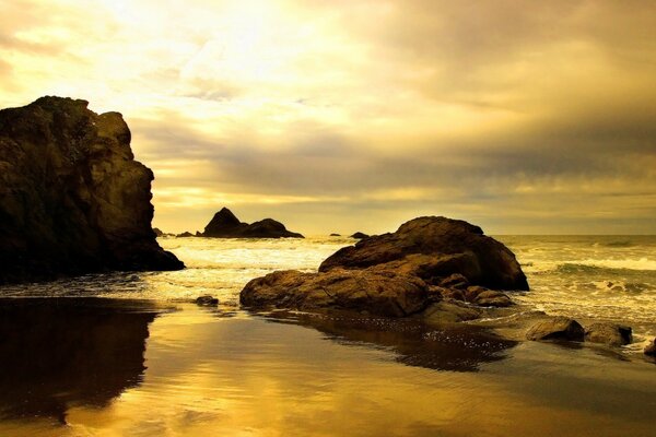 Sunlight through clouds on the beach