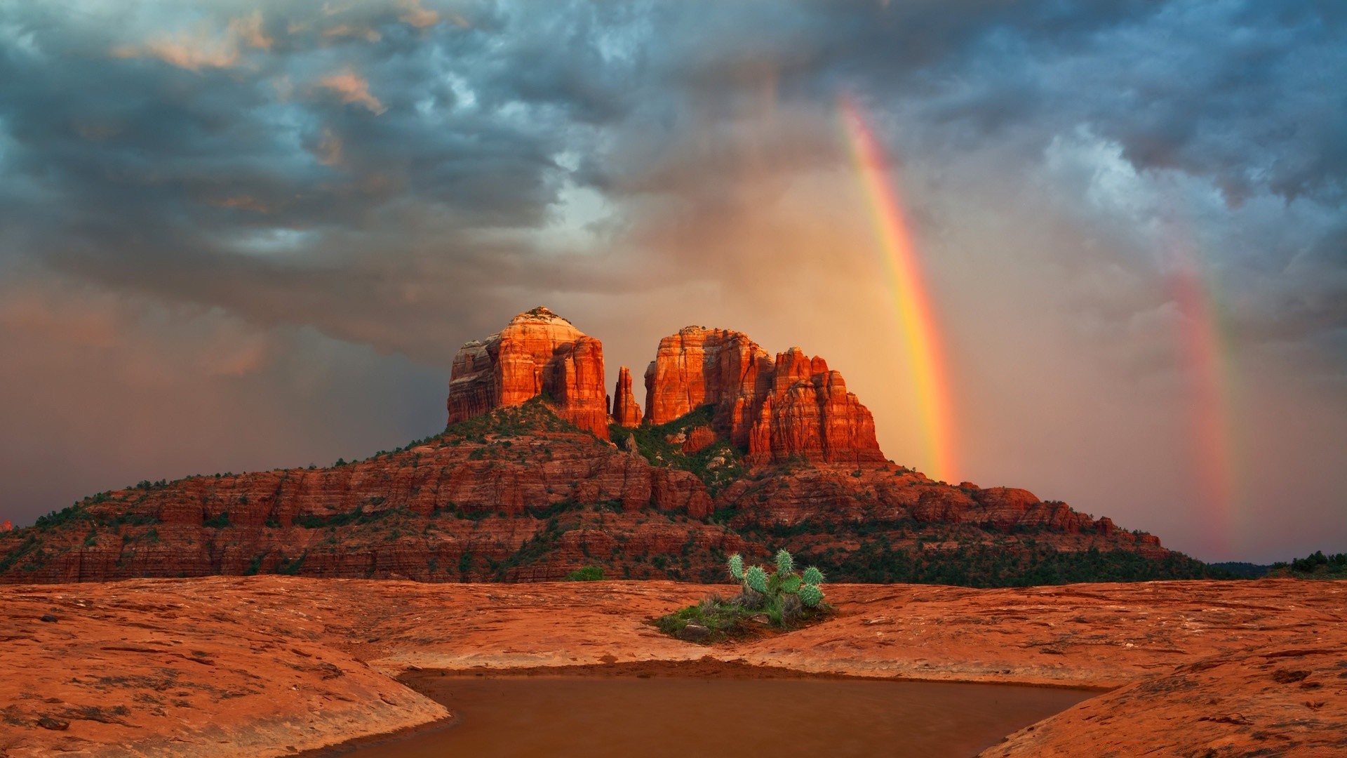 deserto viajar pôr do sol paisagem rocha ao ar livre céu amanhecer montanhas cênica à noite água arco-íris natureza