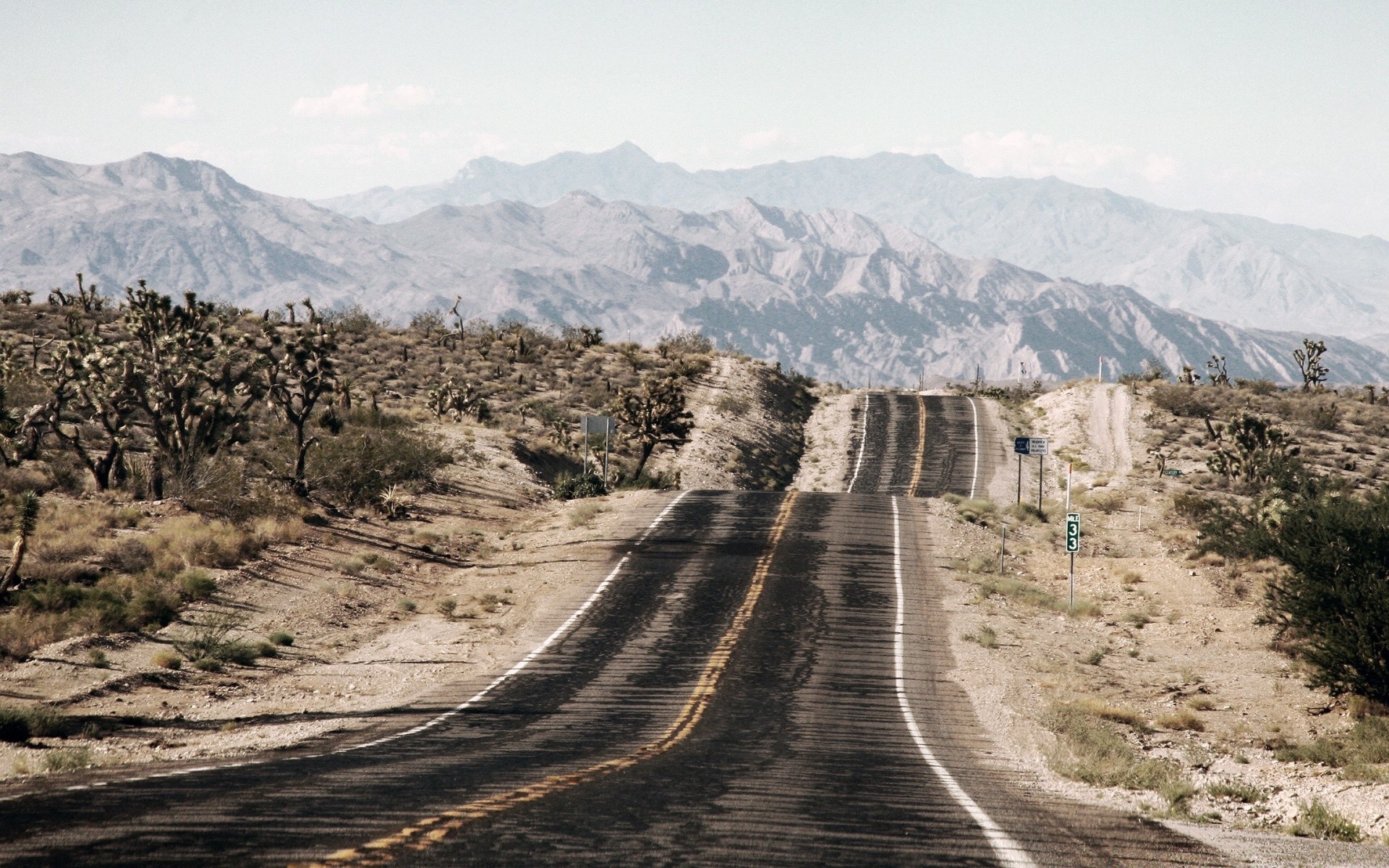 desert landscape nature mountain travel sky road outdoors scenic hill tree rock snow sight