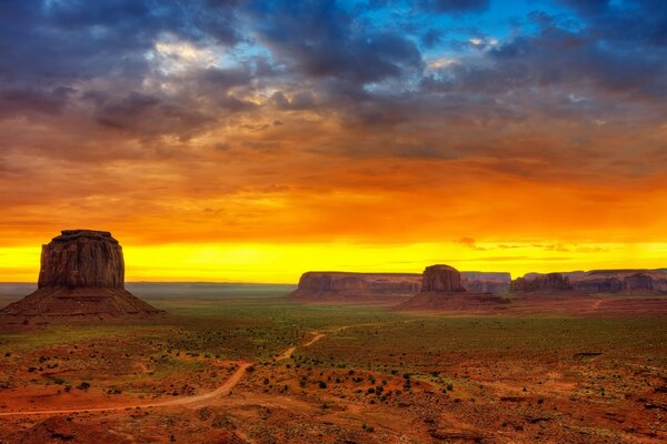 Desert sandstones cloudy sky path sand