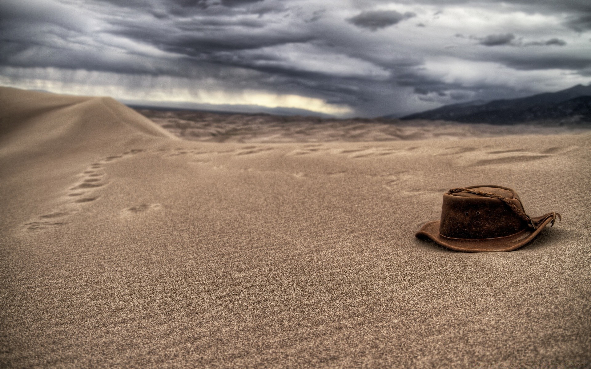 desert sand beach landscape storm seashore sea travel sunset ocean barren sky dune water cloud shadow