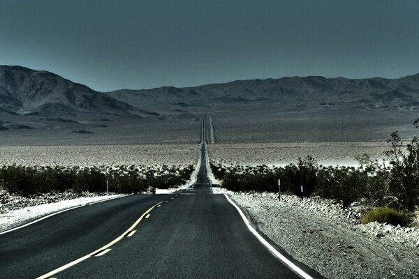 A distant road in the middle of the desert