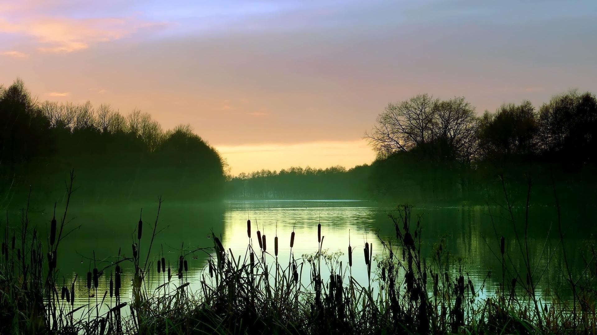 coucher de soleil et aube aube coucher de soleil eau lac nature réflexion soleil paysage ciel à l extérieur été beau temps sang-froid soir crépuscule rivière herbe