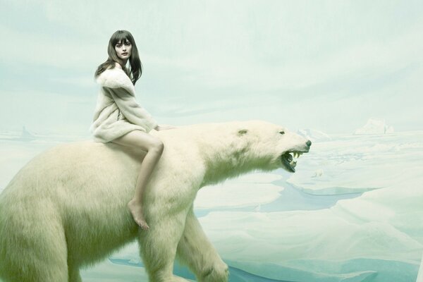 Chica sentada en un oso polar