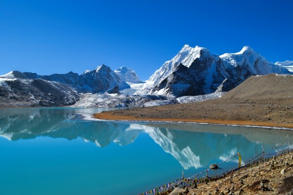 Blue lake among white rocks