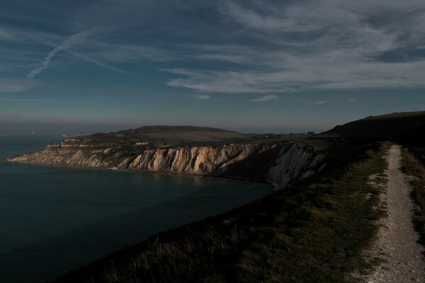 Trail on the bluff by the blue sea