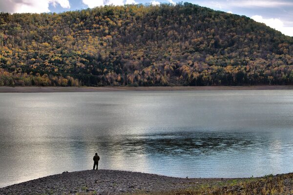 A lonely man on a deserted beach