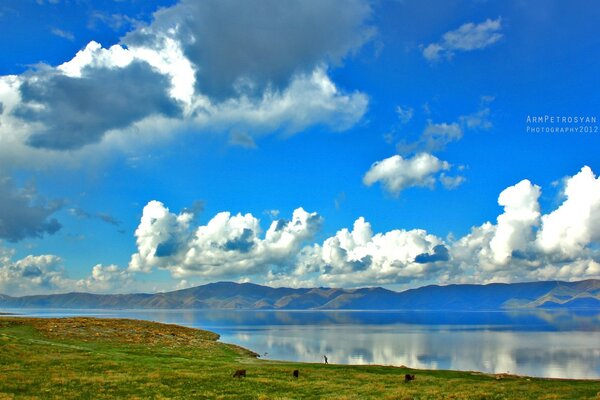 Clouds over the river and hills summer