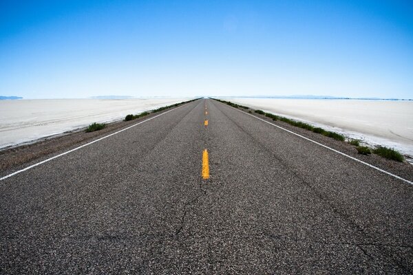 Landscape with a highway stretching into the distance